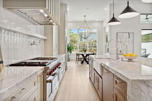 Chandelier, Dining room, Interior, Kitchen, Pendant Lights, Recessed Lighting, Stainless Steel Appliances, Wood Texture Flooring