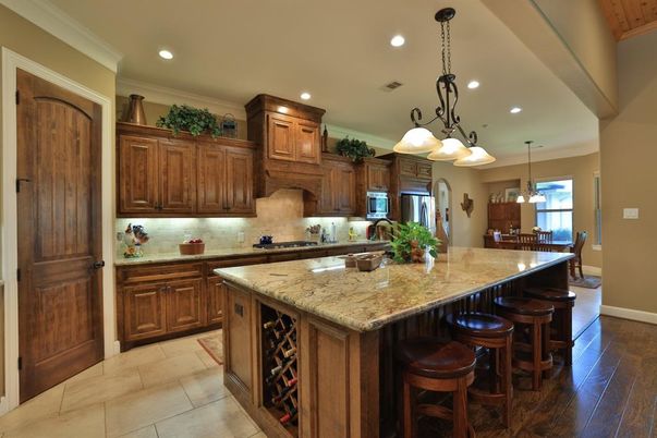 Chandelier, Interior, Kitchen, Pendant Lights, Recessed Lighting, Stainless Steel Appliances, Wood Texture Flooring