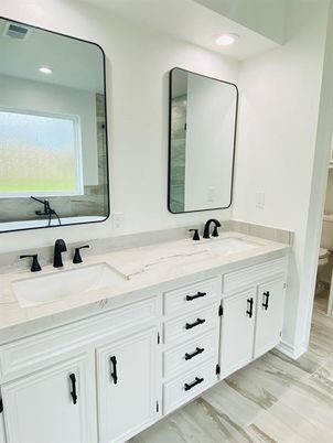 Bathroom, Dual Sink Vanities, Interior, Recessed Lighting, Wood Texture Flooring