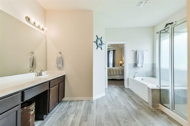 Bathroom, Bedroom, Dual Sink Vanities, Glass Shower, Interior, Wood Texture Flooring