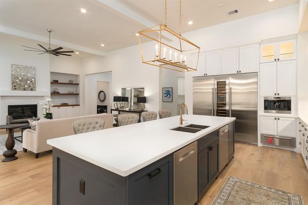Fireplace, Interior, Kitchen, Living room, Pendant Lights, Recessed Lighting, Stainless Steel Appliances, Wood Texture Flooring