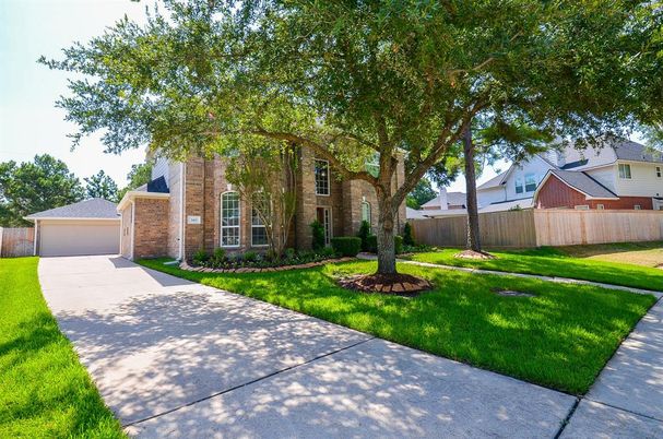 Backyard, Detached Garage, Exterior, Facade, Brick Facade, None