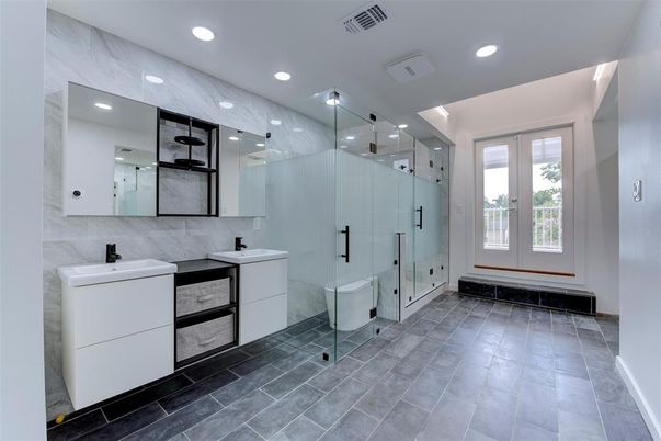 Bathroom, Dual Sink Vanities, Glass Shower, Interior, Marble Walls, Recessed Lighting