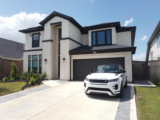 Attached, Exterior, Facade, Brick Facade, Modern