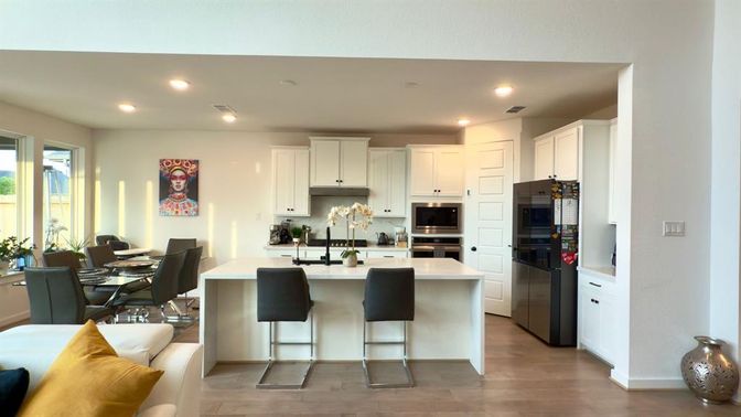 Dining room, Interior, Kitchen, Recessed Lighting, Stainless Steel Appliances, Wood Texture Flooring