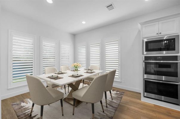 Dining room, Interior, Recessed Lighting, Stainless Steel Appliances, Wood Texture Flooring