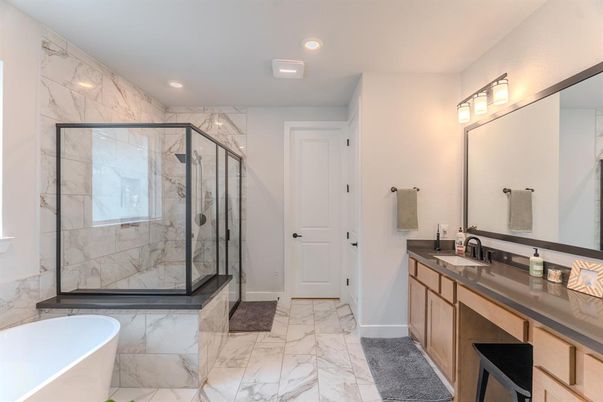 Bathroom, Dual Sink Vanities, Free Standing Baths, Glass Shower, Interior, Marble, Marble Walls, Recessed Lighting
