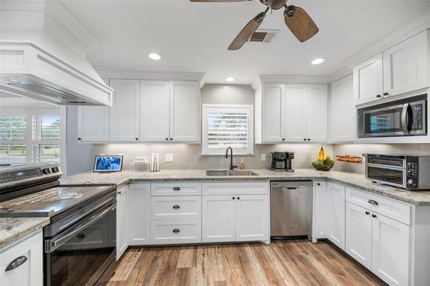 Interior, Kitchen, Recessed Lighting, Stainless Steel Appliances, Wood Texture Flooring