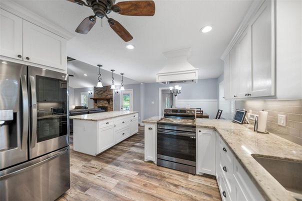 Chandelier, Interior, Kitchen, Pendant Lights, Recessed Lighting, Stainless Steel Appliances, Wood Texture Flooring