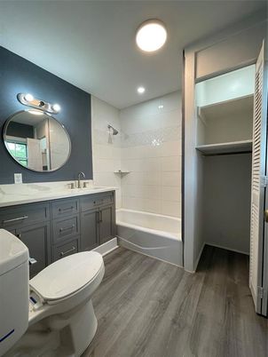 Bathroom, Dual Sink Vanities, Interior, Recessed Lighting, Wood Texture Flooring