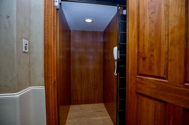 Elevator, Interior, Recessed Lighting, Wood Texture Flooring, Wooden Walls
