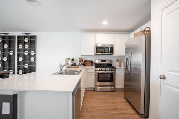 Interior, Kitchen, Recessed Lighting, Stainless Steel Appliances, Wood Texture Flooring