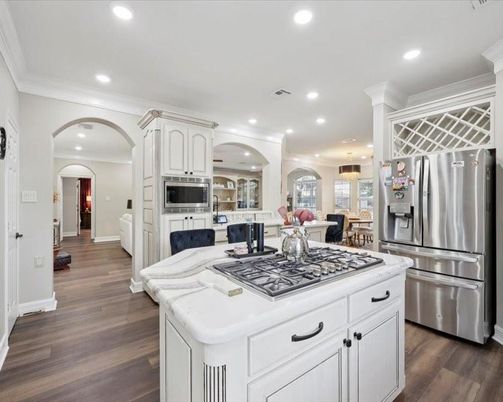 Dining room, Interior, Kitchen, Pendant Lights, Recessed Lighting, Stainless Steel Appliances, Wood Texture Flooring