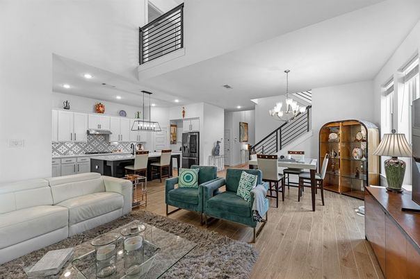 Chandelier, Dining room, Interior, Kitchen, Living room, Pendant Lights, Recessed Lighting, Stainless Steel Appliances, Wood Texture Flooring
