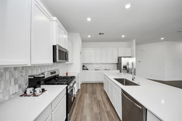 Interior, Kitchen, Recessed Lighting, Stainless Steel Appliances, Wood Texture Flooring