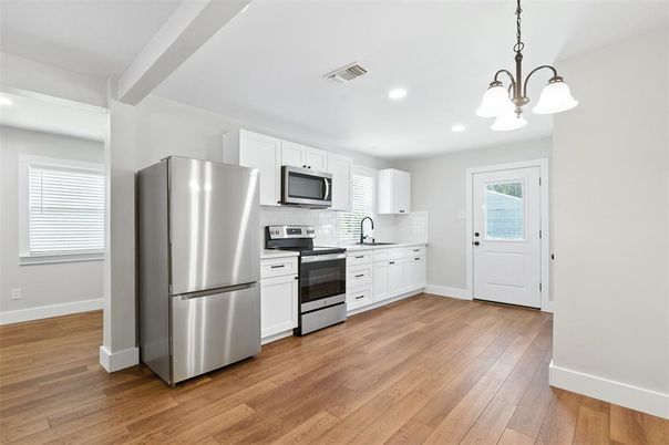 Interior, Kitchen, Pendant Lights, Recessed Lighting, Stainless Steel Appliances, Wood Texture Flooring