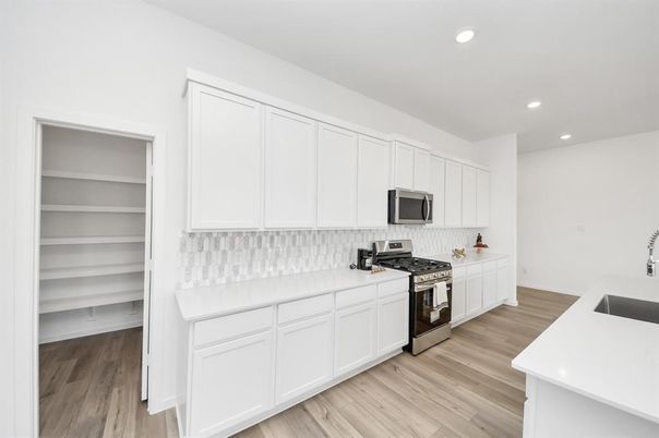 Interior, Kitchen, Recessed Lighting, Stainless Steel Appliances, Wood Texture Flooring