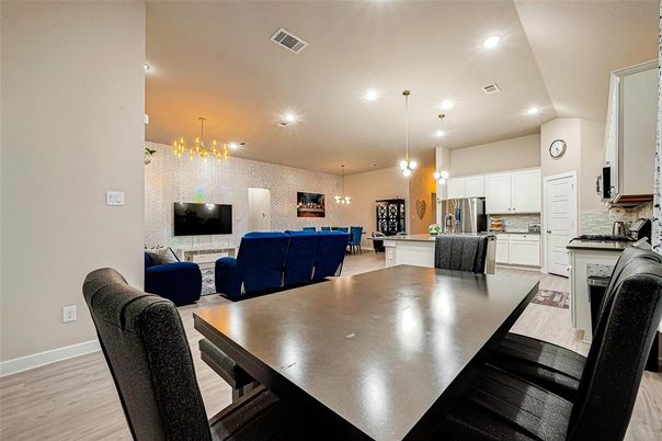 Dining room, Interior, Kitchen, Living room, Pendant Lights, Recessed Lighting, Stainless Steel Appliances, Wood Texture Flooring