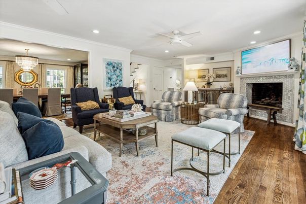 Chandelier, Dining room, Fireplace, Interior, Living room, Recessed Lighting, Wood Texture Flooring