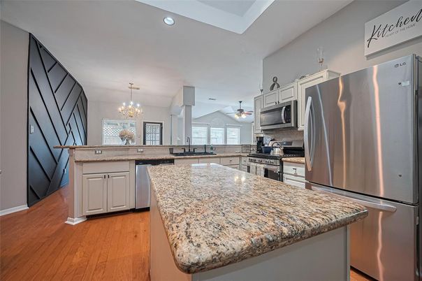 Chandelier, Interior, Kitchen, Recessed Lighting, Stainless Steel Appliances, Wood Texture Flooring