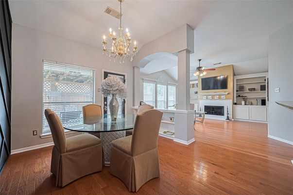 Chandelier, Dining room, Fireplace, Interior, Wood Texture Flooring
