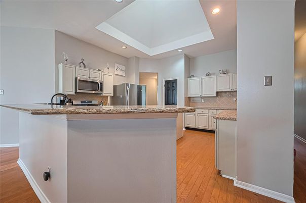 Interior, Kitchen, Recessed Lighting, Stainless Steel Appliances, Wood Texture Flooring