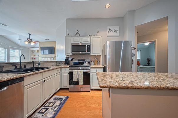 Interior, Kitchen, Recessed Lighting, Stainless Steel Appliances, Wood Texture Flooring