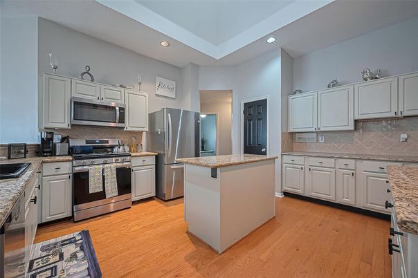 Interior, Kitchen, Recessed Lighting, Stainless Steel Appliances, Wood Texture Flooring