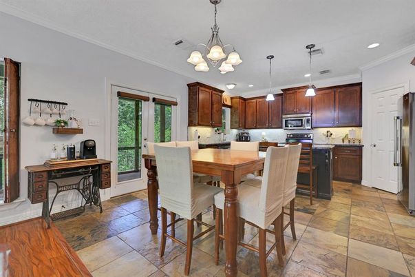 Chandelier, Dining room, Interior, Kitchen, Pendant Lights, Recessed Lighting, Stainless Steel Appliances