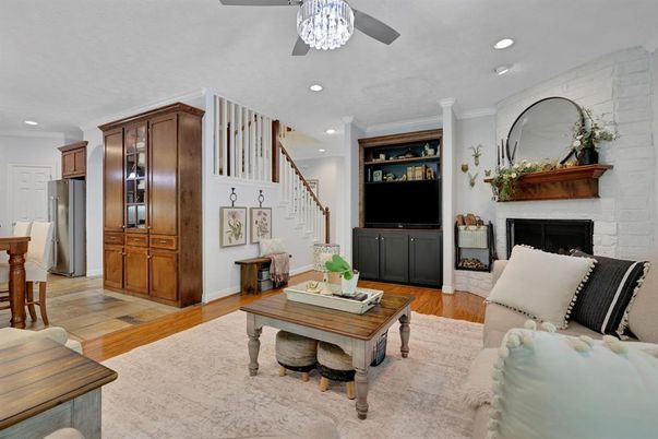 Fireplace, Interior, Kitchen, Living room, Recessed Lighting, Stone Walls, Wood Texture Flooring