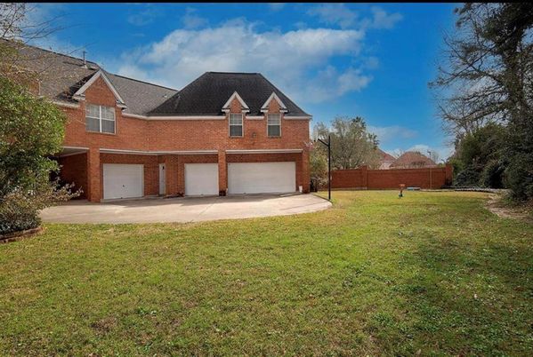 Attached, Backyard, Exterior, Facade, Brick Facade, Brick Traditional