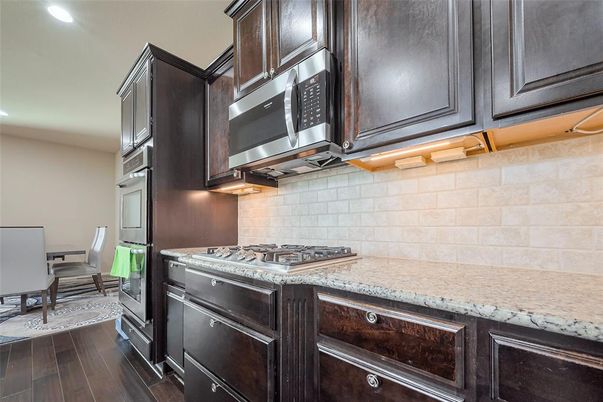 Dining room, Interior, Kitchen, Recessed Lighting, Stainless Steel Appliances, Wood Texture Flooring