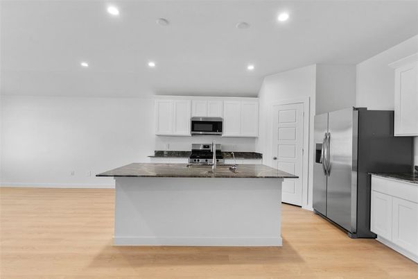 Interior, Kitchen, Recessed Lighting, Stainless Steel Appliances, Wood Texture Flooring