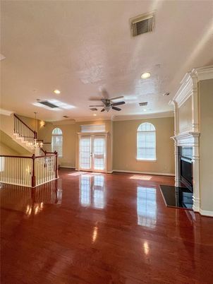 Chandelier, Empty room, Fireplace, Interior, Recessed Lighting, Wood Texture Flooring