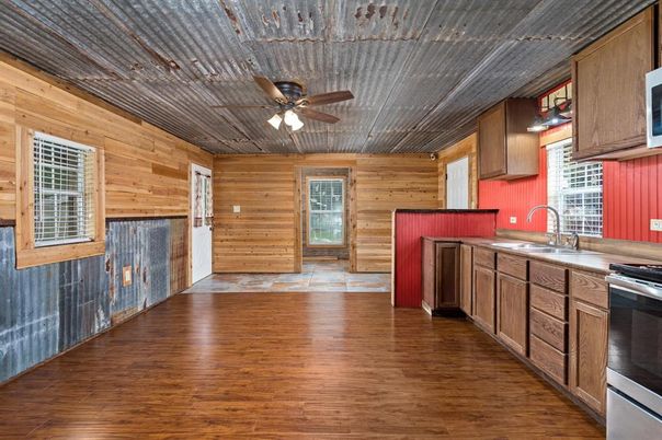 Interior, Kitchen, Stainless Steel Appliances, Wood Texture Flooring, Wooden Walls