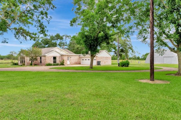 Attached, Backyard, Exterior, Facade, Brick Facade, None