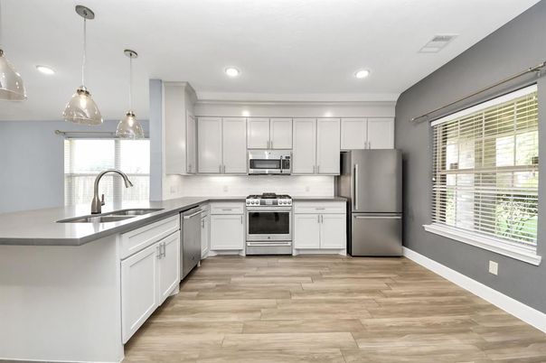 Interior, Kitchen, Pendant Lights, Recessed Lighting, Stainless Steel Appliances, Wood Texture Flooring