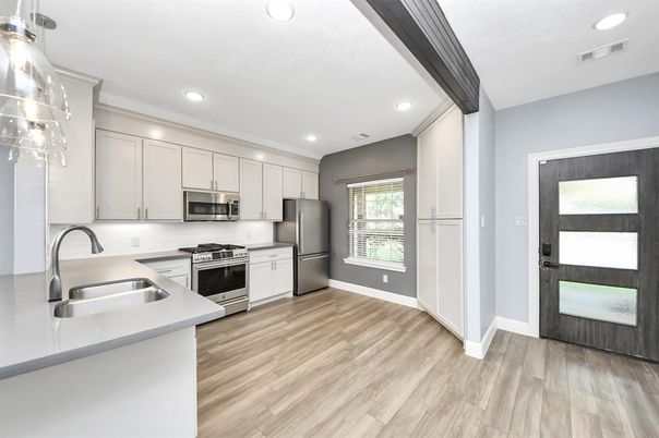 Interior, Kitchen, Recessed Lighting, Stainless Steel Appliances, Wood Texture Flooring