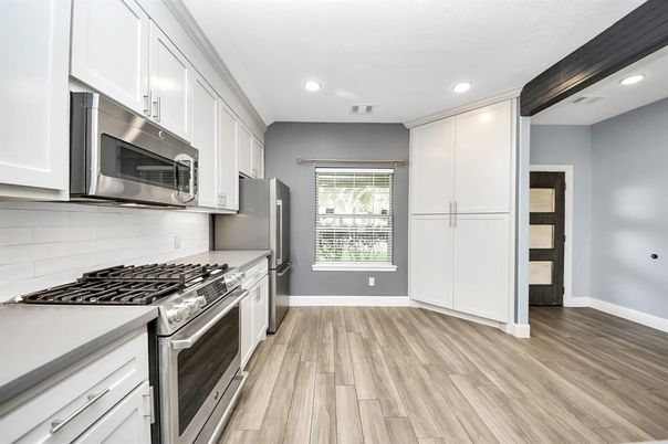 Interior, Kitchen, Recessed Lighting, Stainless Steel Appliances, Wood Texture Flooring