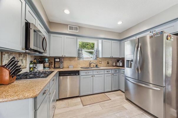 Interior, Kitchen, Recessed Lighting, Stainless Steel Appliances, Wood Texture Flooring