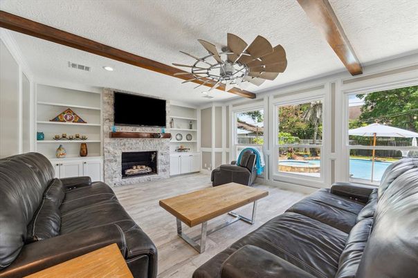 Fireplace, Interior, Living room, Recessed Lighting, Stone Walls, Wooden Beams, Wood Texture Flooring