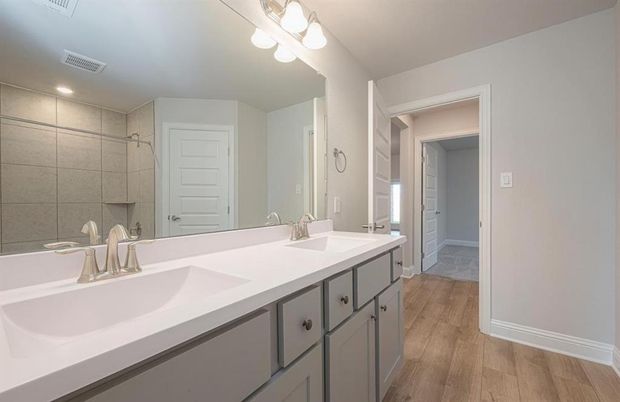 Bathroom, Dual Sink Vanities, Interior, Recessed Lighting, Wood Texture Flooring