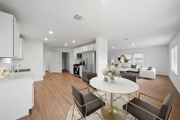 Dining room, Interior, Kitchen, Living room, Recessed Lighting, Stainless Steel Appliances, Wood Texture Flooring