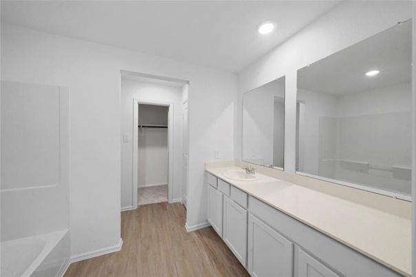 Bathroom, Dual Sink Vanities, Interior, Recessed Lighting, Wood Texture Flooring