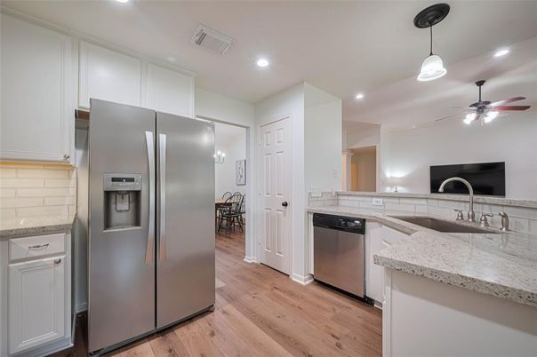 Dining room, Interior, Kitchen, Pendant Lights, Recessed Lighting, Stainless Steel Appliances, Wood Texture Flooring