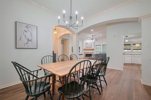 Chandelier, Dining room, Fireplace, Interior, Recessed Lighting, Wood Texture Flooring