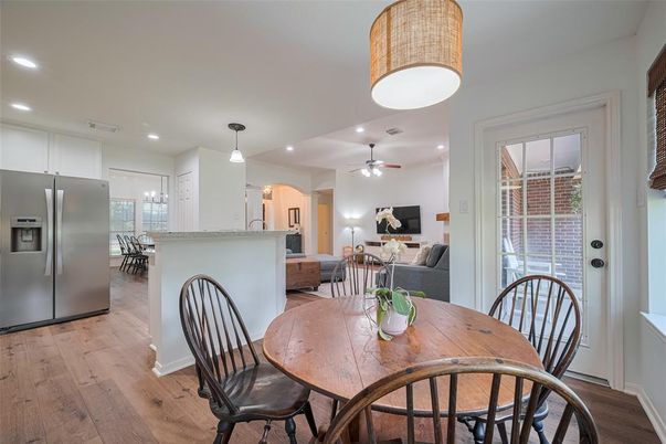 Dining room, Interior, Kitchen, Living room, Pendant Lights, Recessed Lighting, Stainless Steel Appliances, Wood Texture Flooring
