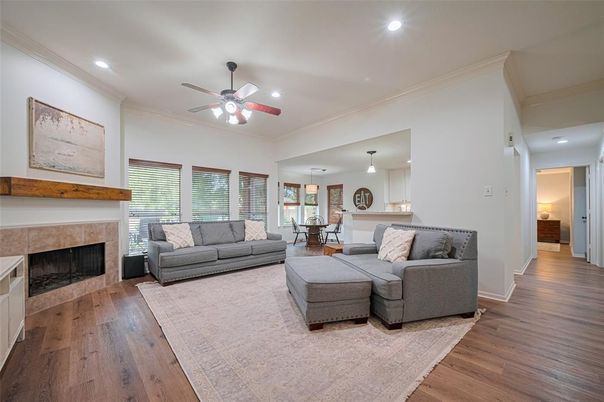 Dining room, Fireplace, Interior, Living room, Pendant Lights, Recessed Lighting, Wood Texture Flooring