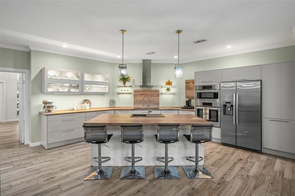 Interior, Kitchen, Pendant Lights, Recessed Lighting, Stainless Steel Appliances, Wood Texture Flooring