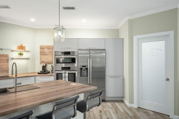 Interior, Kitchen, Pendant Lights, Recessed Lighting, Stainless Steel Appliances, Wood Texture Flooring